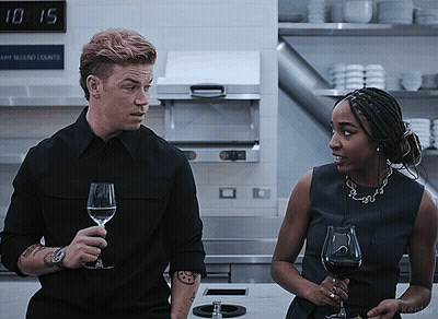 Man And Woman Holding Wine Glasses GIF