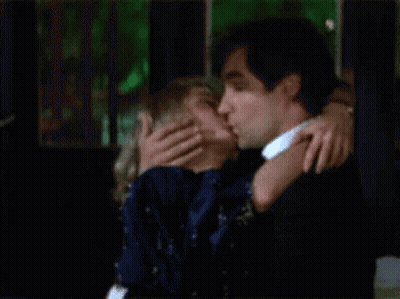 Man And Woman Hugging And Kissing GIF