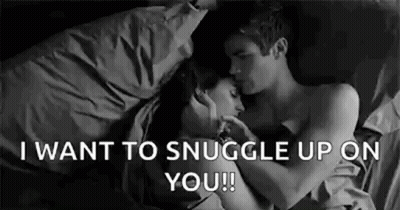 Man And Woman Hugging And Kissing In Bed GIF