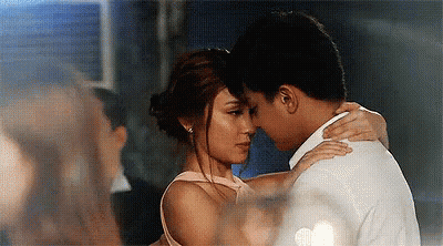 Man And Woman Hugging And Kissing In Room GIF