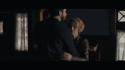 Man And Woman Hugging And Looking At Each Other GIF