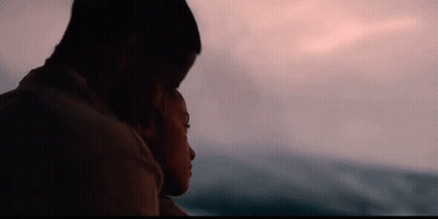 Man And Woman Hugging At Sunset Ocean GIF