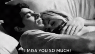 Man And Woman Hugging In Bed Black And White GIF