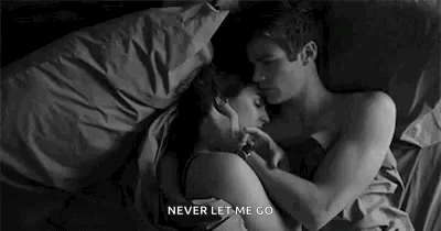 Man And Woman Hugging In Bed GIF