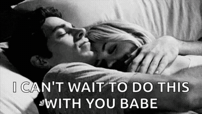 Man And Woman Hugging In Bed GIF