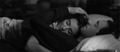 Man And Woman Hugging In Bed GIF