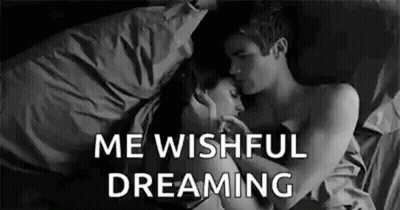 Man And Woman Hugging In Bed GIF
