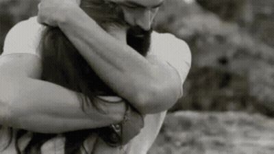 Man And Woman Hugging In Black And White GIF