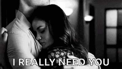 Man and Woman Hugging in Black and White Saying I Really Need You