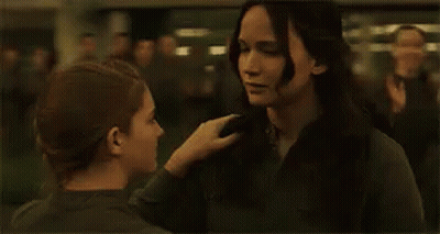 Man And Woman Hugging In Crowd GIF