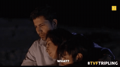 Man And Woman Hugging In Dark Room Asking What GIF