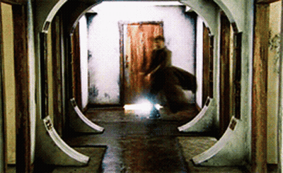 Man And Woman Hugging In Front Of Brick Wall GIF