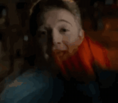 Man And Woman Hugging In Front Of Smith Sign GIF