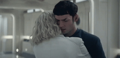Man And Woman Hugging In Hallway GIF
