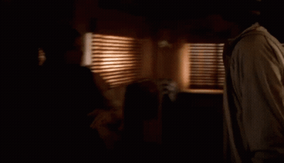 Man And Woman Hugging In Kitchen GIF