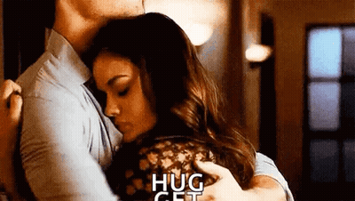 Man And Woman Hugging In Living Room GIF