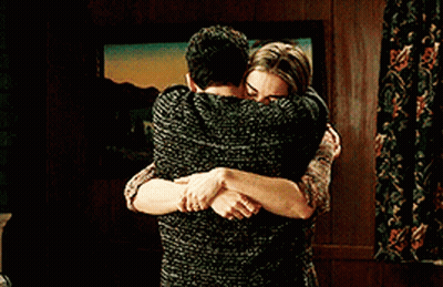 Man And Woman Hugging In Living Room GIF