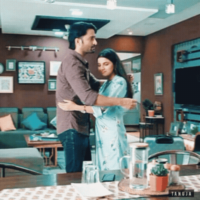Man And Woman Hugging In Living Room Tanuja GIF