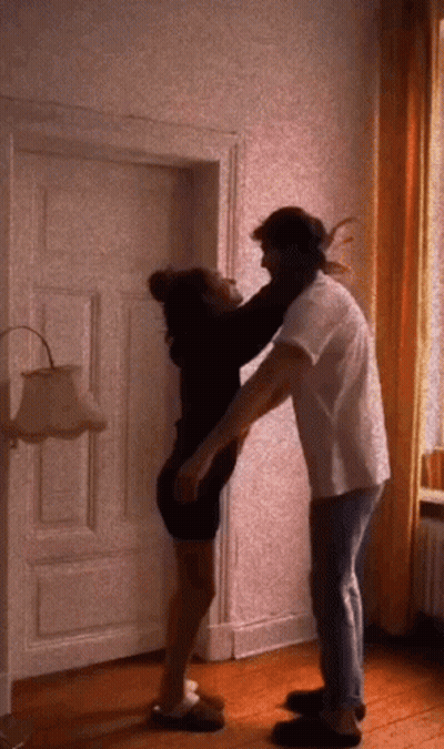 Man And Woman Hugging In Room GIF