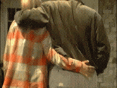 Man And Woman Hugging In Room GIF