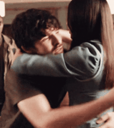 Man And Woman Hugging GIF