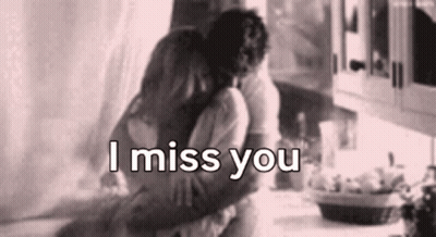 Man And Woman Hugging Kitchen I Miss You GIF