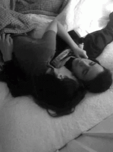 Man And Woman Hugging On Bed GIF