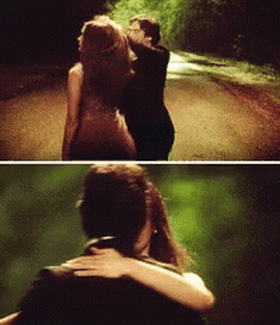Man And Woman Hugging On Dirt Road GIF
