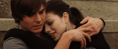 Man And Woman Hugging On Stairs GIF