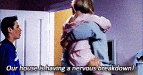 Man And Woman Hugging Our House Is Having A Nervous Breakdown GIF