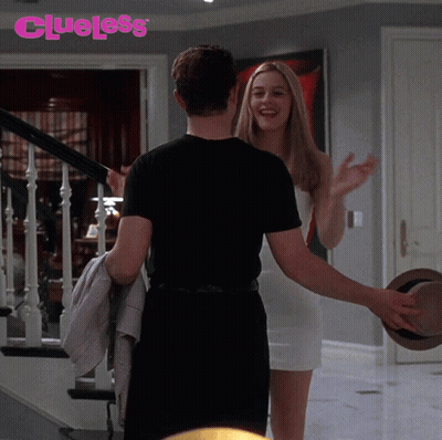 Man And Woman Hugging Saying Clueless GIF