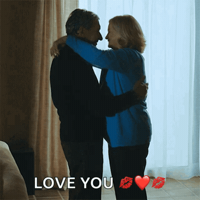 Man And Woman Hugging Saying Love You GIF