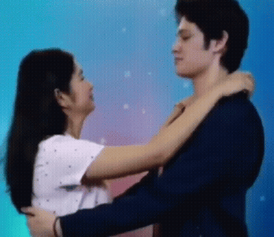 Man And Woman Hugging GIF