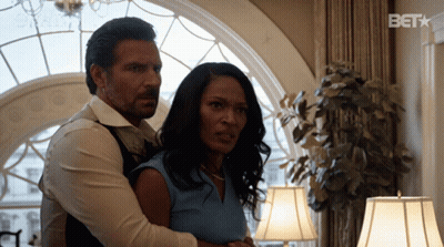 Man and Woman Hugging With BET Logo