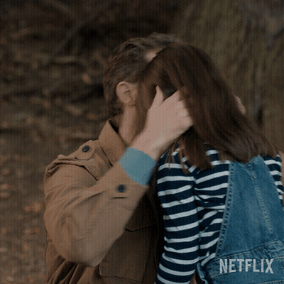 Man And Woman Hugging With Netflix GIF