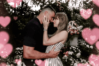 Man And Woman Hugging With Pink Hearts GIF