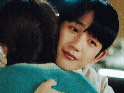 Man And Woman Hugging, Woman In Blue Sweater GIF