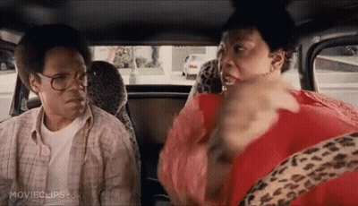 Man And Woman In Back Of Car GIF