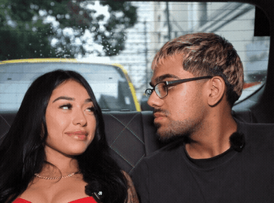 Man And Woman In Back Seat Of Car GIF