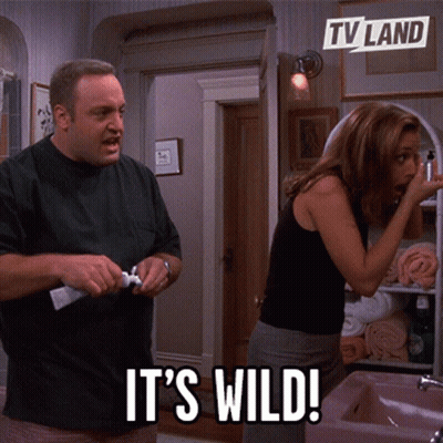 Man And Woman In Bathroom Saying It's Wild GIF