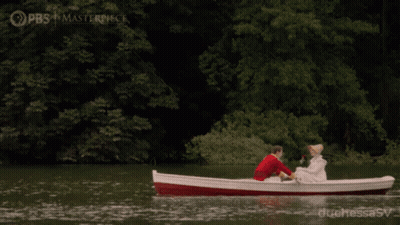 Man And Woman In Boat On Lake Sponsored By PBS And Masterpiece GIF