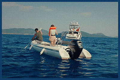 Man And Woman In Boat On Ocean GIF