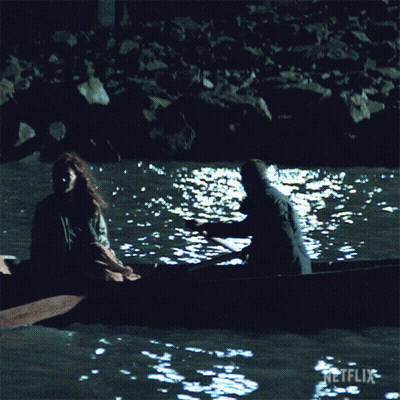 Man And Woman In Boat With Netflix GIF