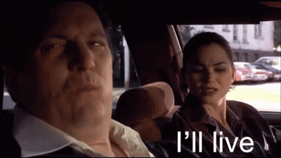 Man And Woman In Car Saying I'll Live GIF