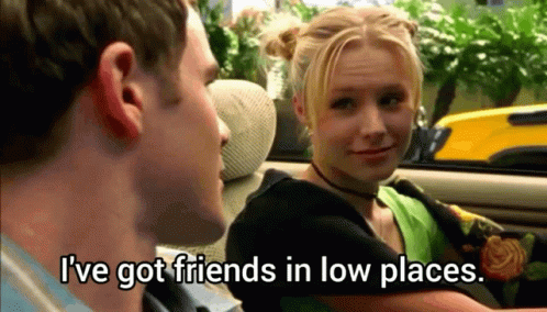 Man And Woman In Car Saying I've Got Friends In Low Places GIF