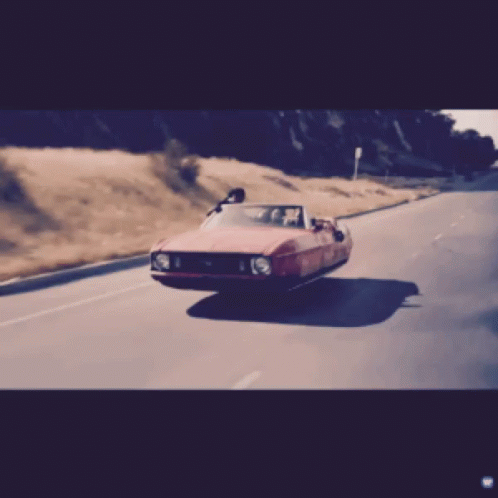 Man And Woman In Car With BMW Shirt GIF