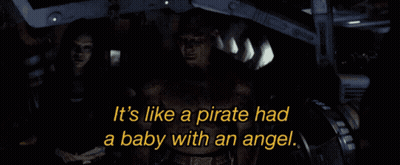 Man And Woman In Dark Room Saying It's Like A Pirate Had A Baby With An Angel GIF