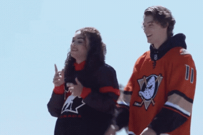 Man And Woman In Ducks Jerseys GIF