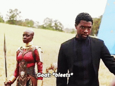 Man And Woman In Field Saying Goat Bleats GIF
