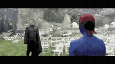 Man And Woman In Field With White Chairs GIF